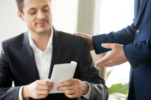 istock Happy businessman receiving white envelope with bribe, bribery corruption concept 804671658