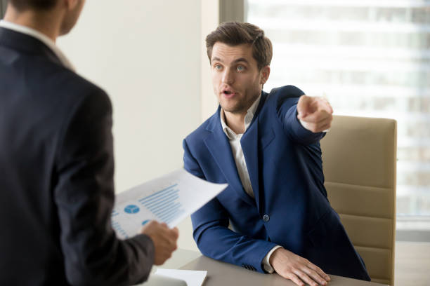 istock Furious boss firing incompetent employee, dissatisfied with bad work result 804671668