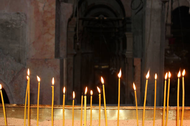 istock candles in the temple 804674204