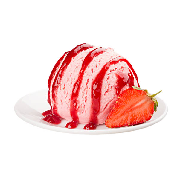 Ice cream pink scoop on plate decorated jam strips and slice strawberry, isolated on white background.