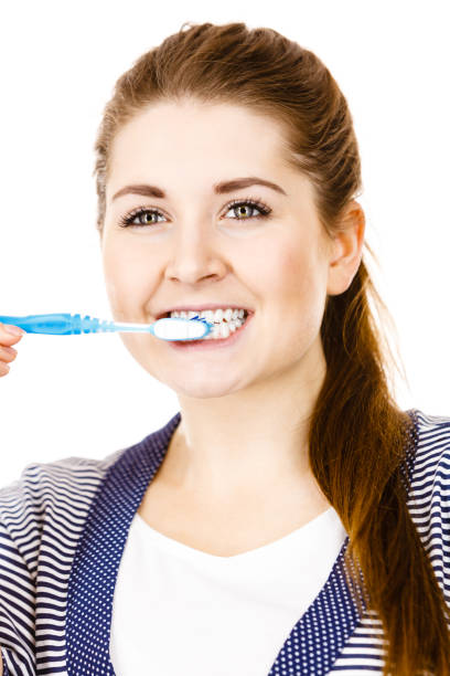 istock Woman brushing cleaning teeth. 804677242