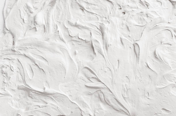 istock White decorative abstract plaster texture with waves and swirls. 804681474