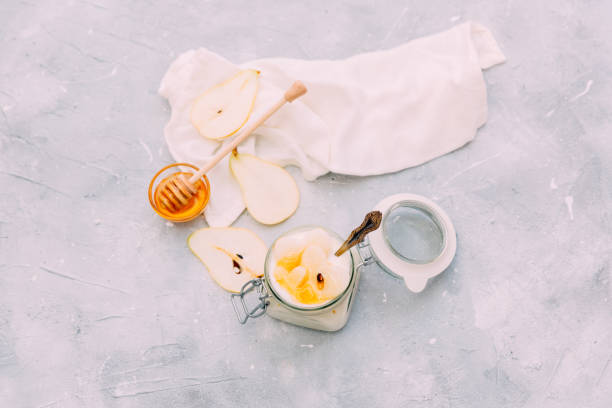 istock home sweet yogurt with pear  in a glass jar 804682044
