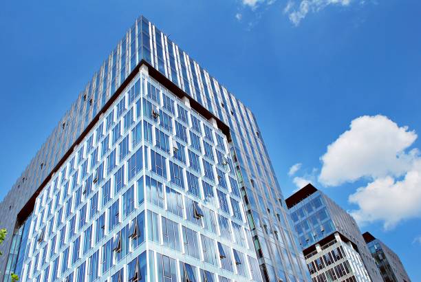 istock Modern building.Modern office building with facade of glass 804695254