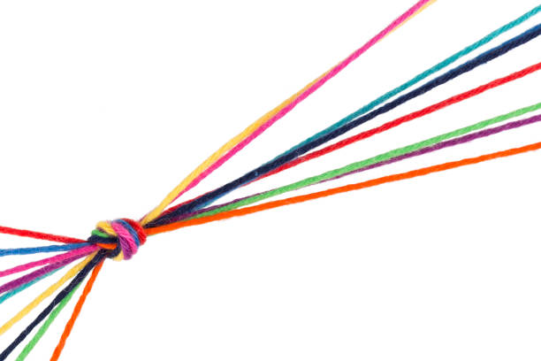 istock colorful strings in a knot teamwork connection success concept 804695582