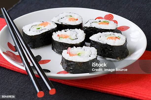 Sushi Rolls Stock Photo - Download Image Now - Sushi, Chopsticks, Close-up