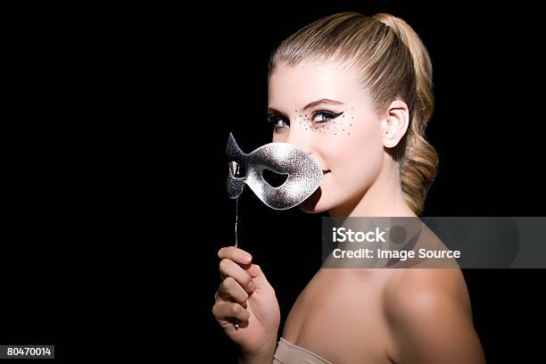 Young Woman With Costume Mask Stockfoto und mehr Bilder von Attraktive Frau - Attraktive Frau, Augenmaske, Blick in die Kamera