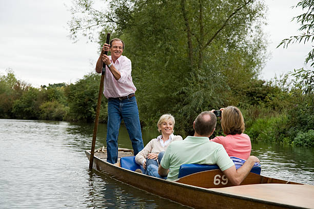 Mature friends punting  punting stock pictures, royalty-free photos & images