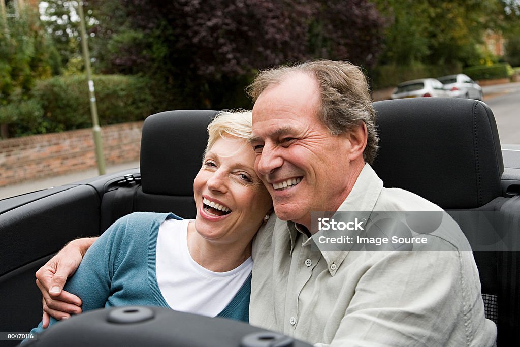 Casal maduro em um carro esportivo - Foto de stock de Adulto royalty-free