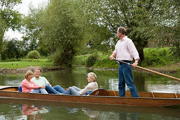 Mature friends punting  punting stock pictures, royalty-free photos & images