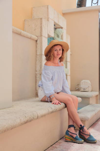 istock Young woman in Mediterranean style downtown. 804701812