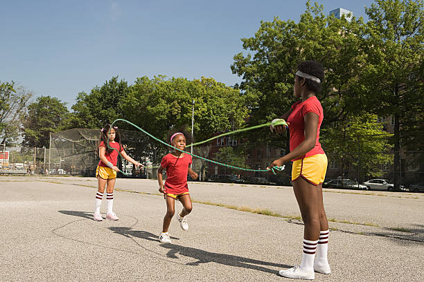 Girls skipping  skipping stock pictures, royalty-free photos & images