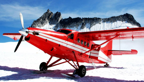 istock Red prop plane on a glacier in Alsaka 804705728