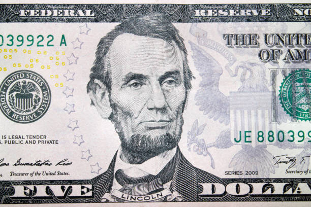 istock five dollars with image of Abraham Lincoln 804705886