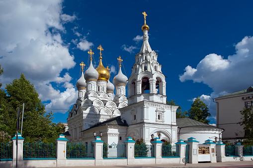 A stunning shot of the Alexander Nevsky Cathedral, one of Sofia's most iconic landmarks, displaying its neo-Byzantine architecture, golden domes, and intricate details, standing as a testament to Bulgaria's rich history and religious heritage.