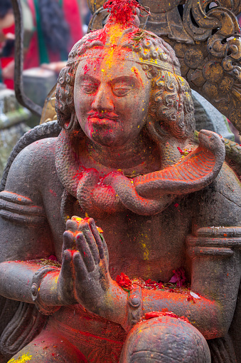 Shiva statue sitting in cobra around his neck. Kathmandu , Nepal.