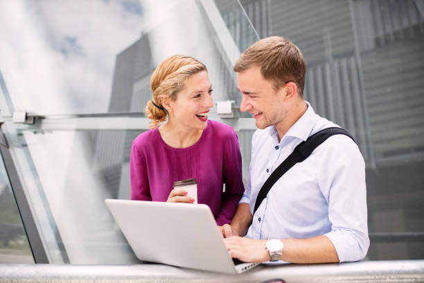 istock Discussing business project together outside 804716748