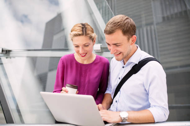 istock Discussing business project together outside 804718858