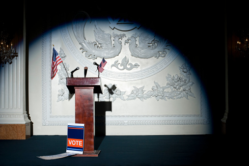 U.S. Department of Defense flag rostrum with microphone. Digitally generated image