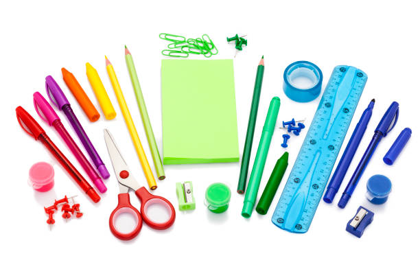 istock Raibow colored office or school supplies on white background 804746870