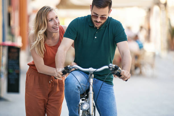 istock Love Couple Riding a Bike 804753722