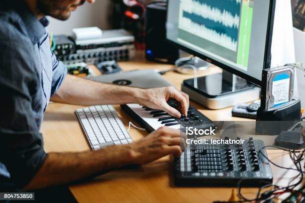 Young Man Creating Music At Home Stock Photo - Download Image Now - Music, Industry, Studio - Workplace