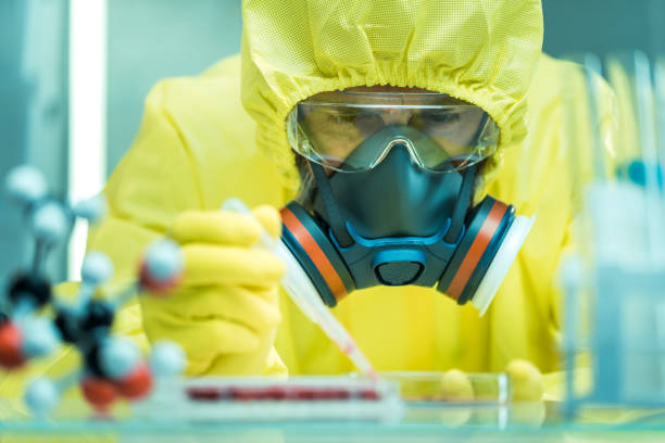 Laboratory Man working with dangerous viruses in the laboratory ebola stock pictures, royalty-free photos & images