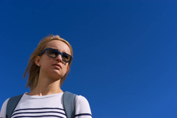 istock young woman waiting for her flight, she is going on vacation 804777646