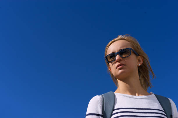 istock young woman waiting for her flight, she is going on vacation 804777694