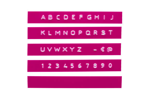 istock Embossed alphabet on purple plastic tape 804783014