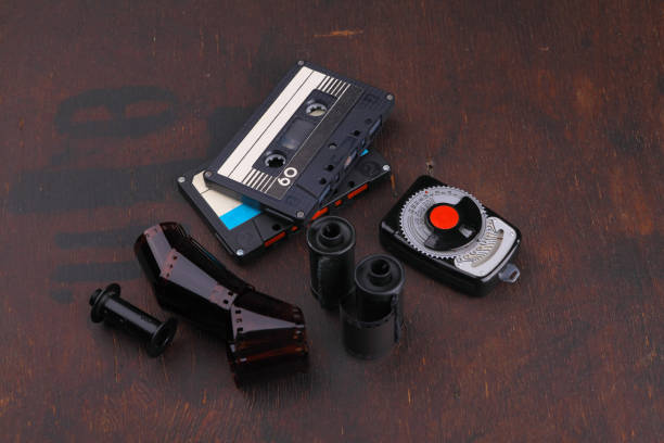 istock Old tape placed stacked on a wooden table. 804785800