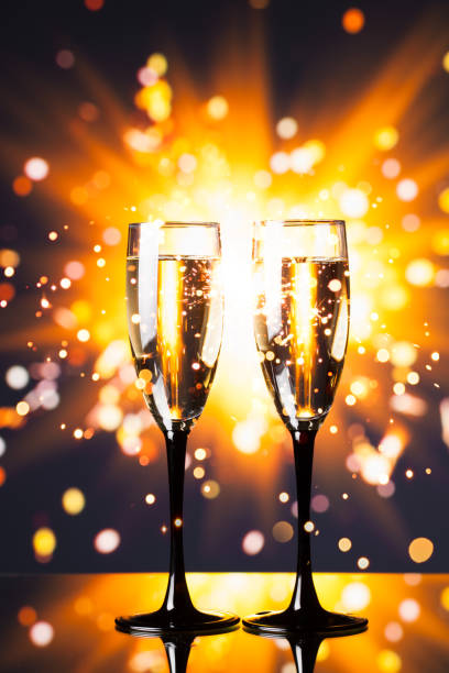 istock champagne glass against sparkler background 804786364