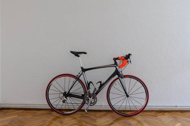 istock Race bike next to white wall 804788978