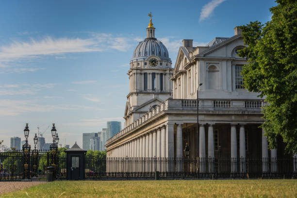 London University of Greenwich London University of Greenwich and black gate with Canary Wharf in the background. greenwich london stock pictures, royalty-free photos & images