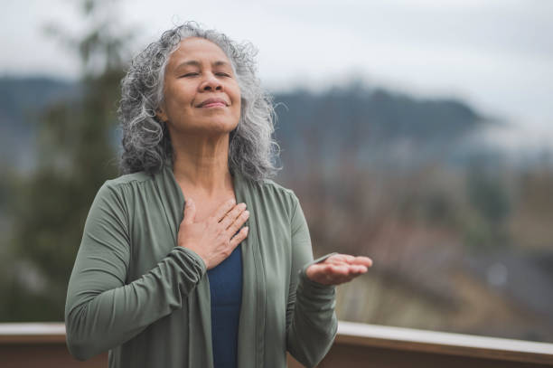 istock Hawaiian woman doing yoga pose outside 804802520