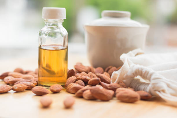 istock Almond oil with almond seed 804824874