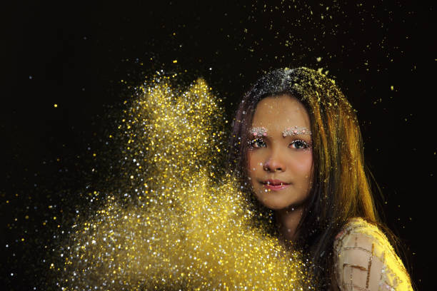 istock Woman with Gllitter Snowflake in dark background 804827486