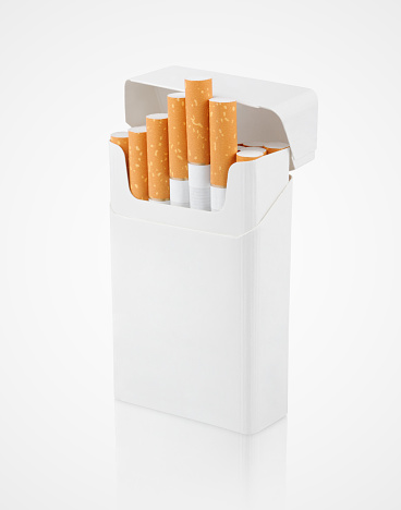 Opened pack of cigarettes standing on gray background with clipping path