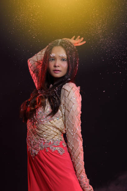 istock Woman with Gllitter Snowflake in dark background 804829810