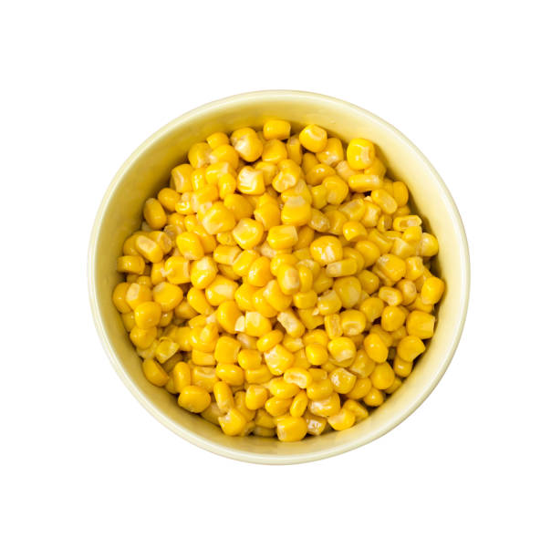 istock sweet corn in a ceramic dish isolated on white background, top view closeup. Flat Lay 804838182