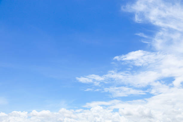 istock beautiful soft white clouds on blue sky with space for background and design 804862254