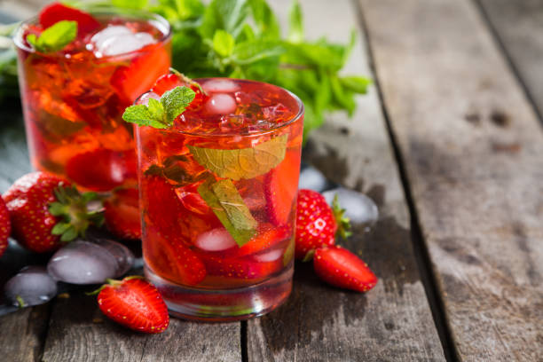 istock Strawberry mojito and ingredients on rustic background 804901258