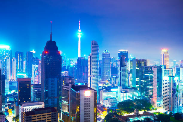 istock Kuala Lumpur skyline at night . Malaysia . 804914406