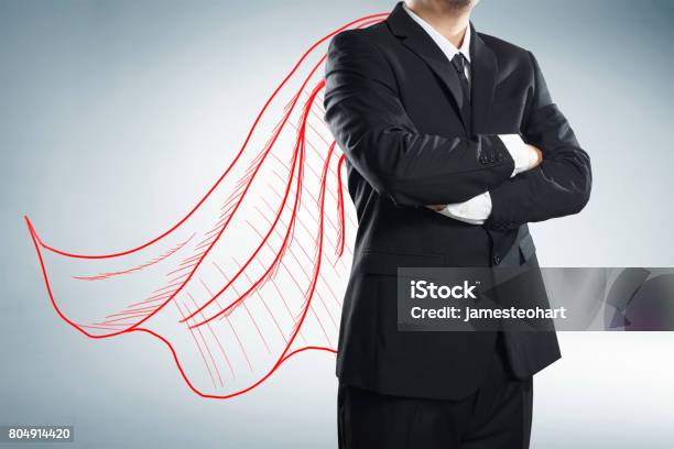 Businessman With Drawn Red Color Cape The Concept Of Success Leadership And Victory In Business Stock Photo - Download Image Now