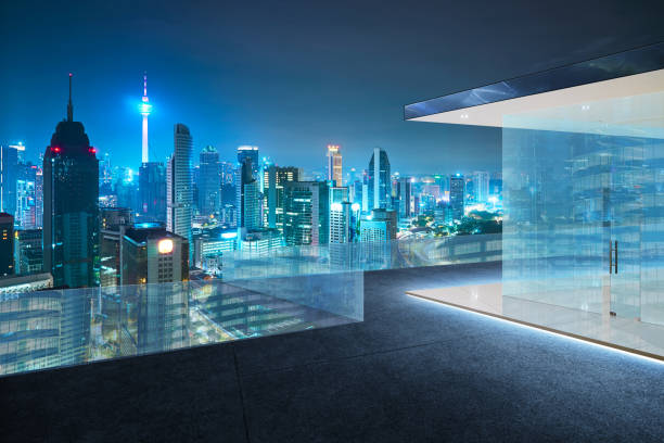 istock Kuala Lumpur skyline at night with balcony view . 804914544