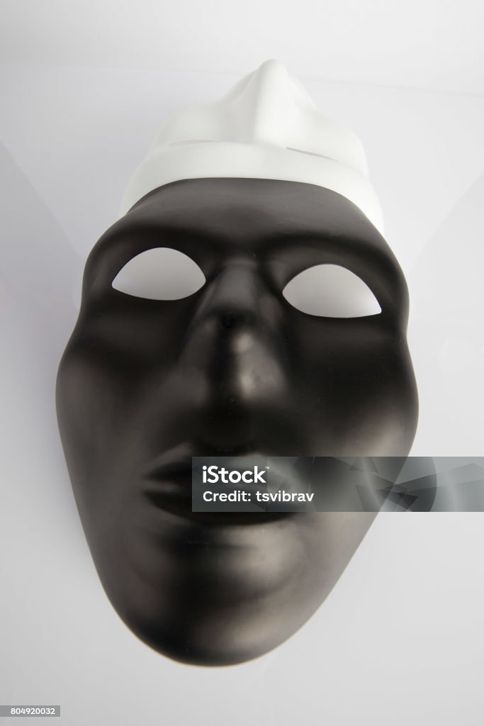 Masks Joined Black And White Masks Joined On White Reflective Background Wide Angle ...