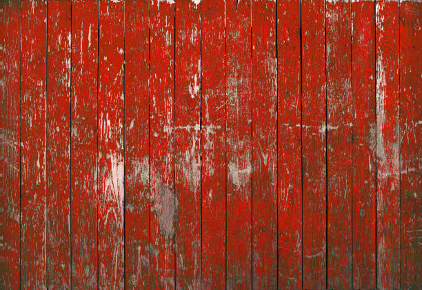 red background wood texture red background wood texture. Vintage old fence with peeling paint red. barn stock pictures, royalty-free photos & images