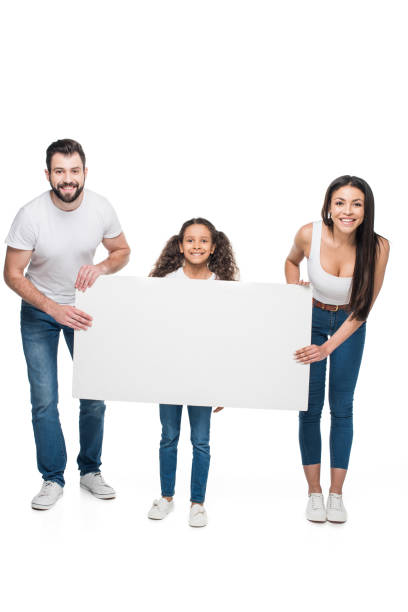 istock happy multiethnic family holding blank banner isolated on white 804934526