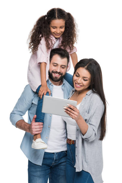 白で隔離デジタル タブレットを使用して幸せなの多民族の家族 - digital tablet family father offspring ストックフォトと画像