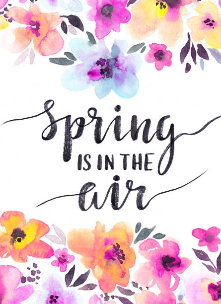 istock Watercolor floral background with gentle flowers. Spring design card with stylish handwritten phrase - 'Spring is in the air'. 804940960
